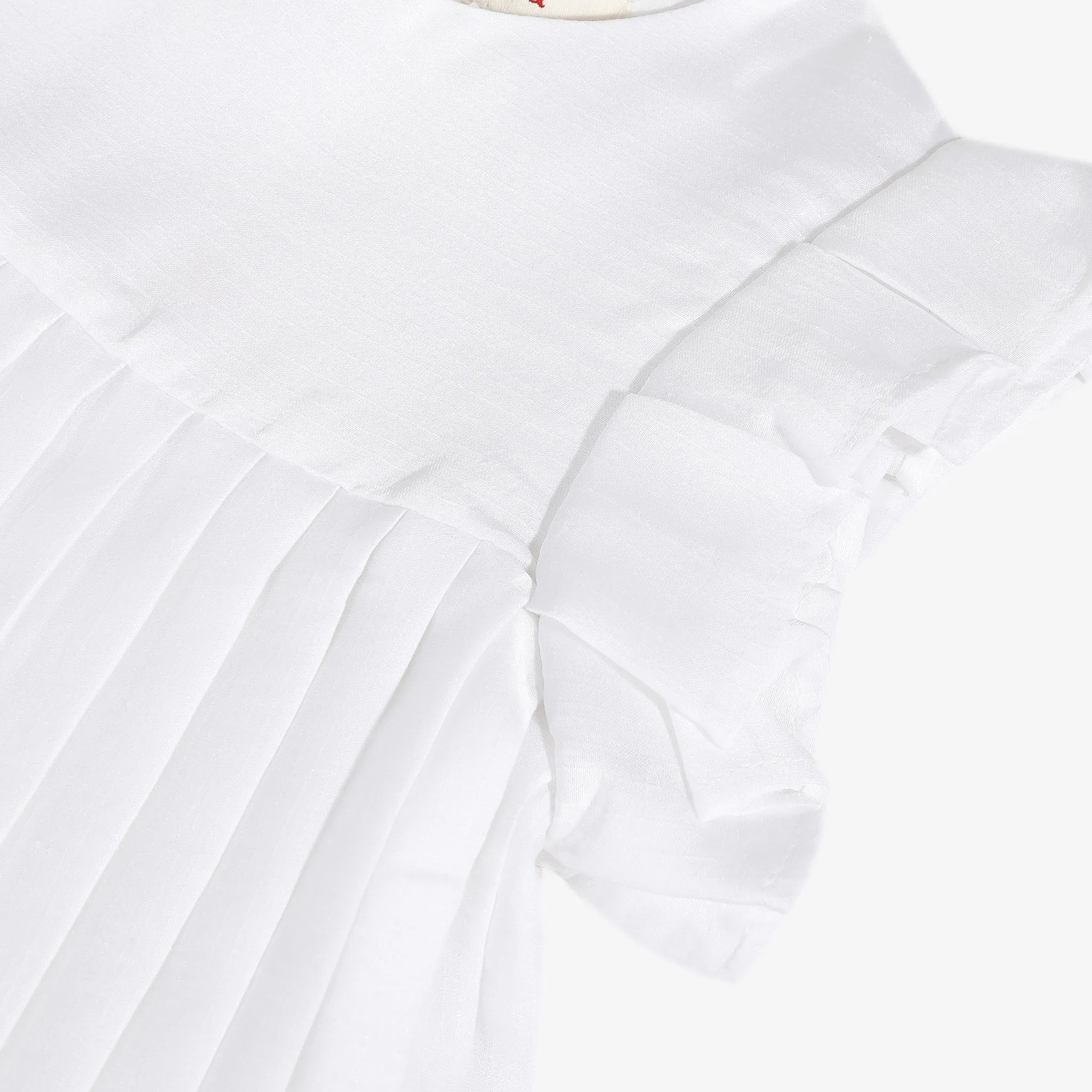 Girls' white pleated dress