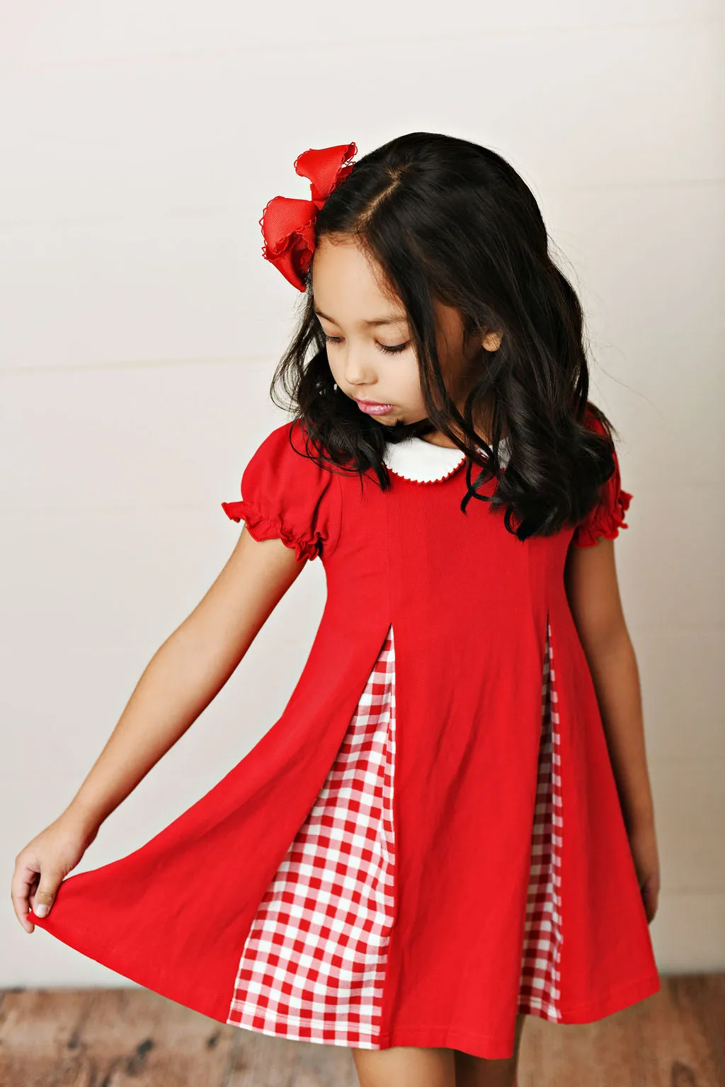 Red gingham pleat dress