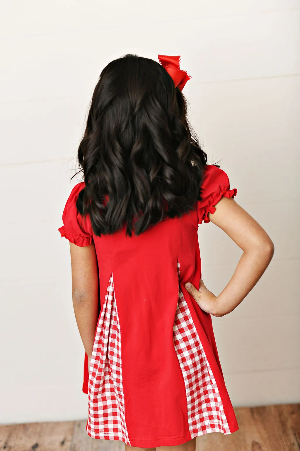 Red gingham pleat dress